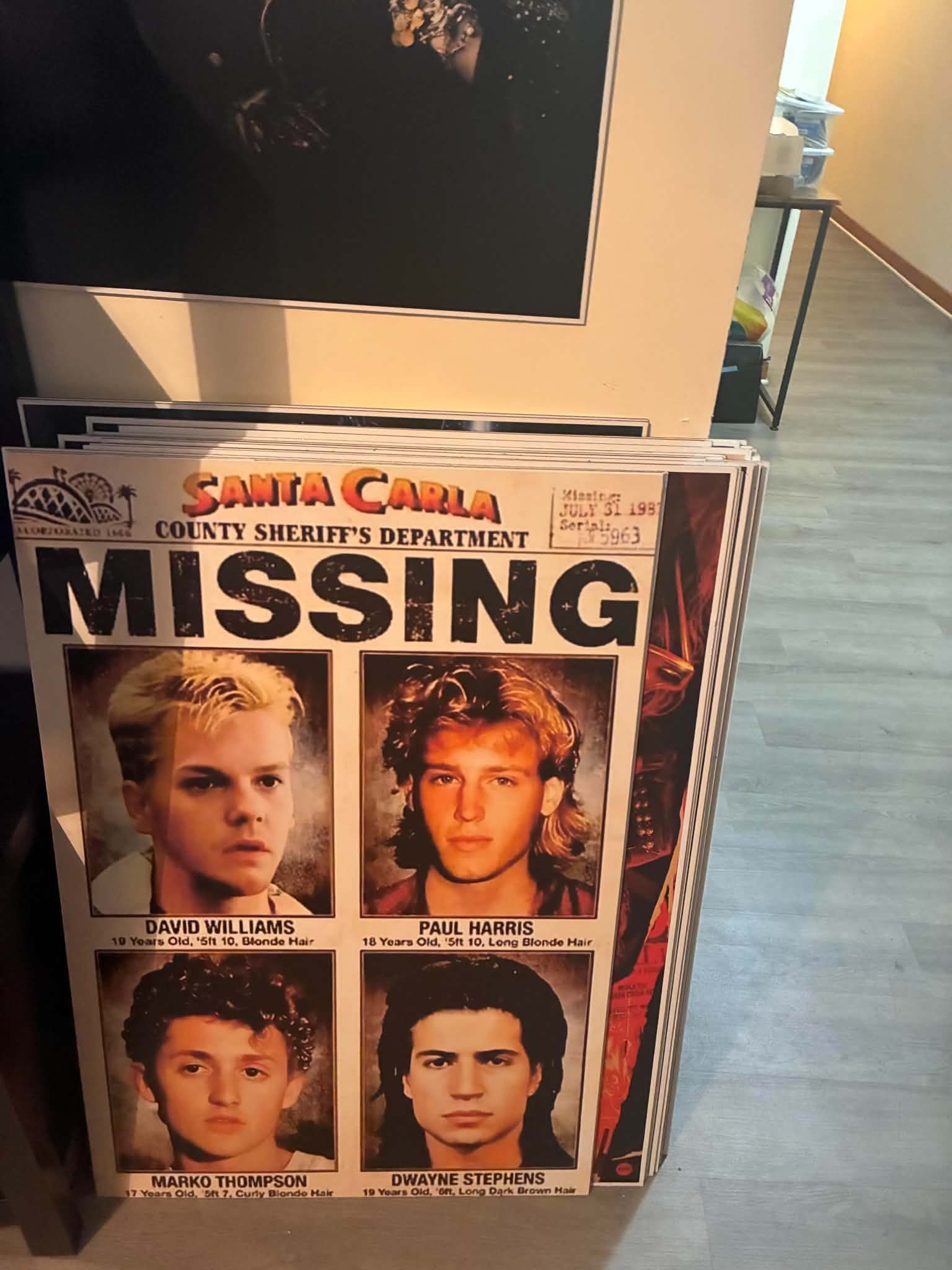 Photo of a Santa Carla County Sheriff's Department missing-persons art print featuring four missing teenage boys from The Lost Boys